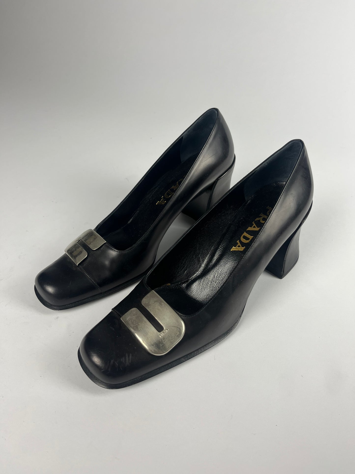 Prada Metallic Buckle Black Leather Pumps - 38 IT/39 EU